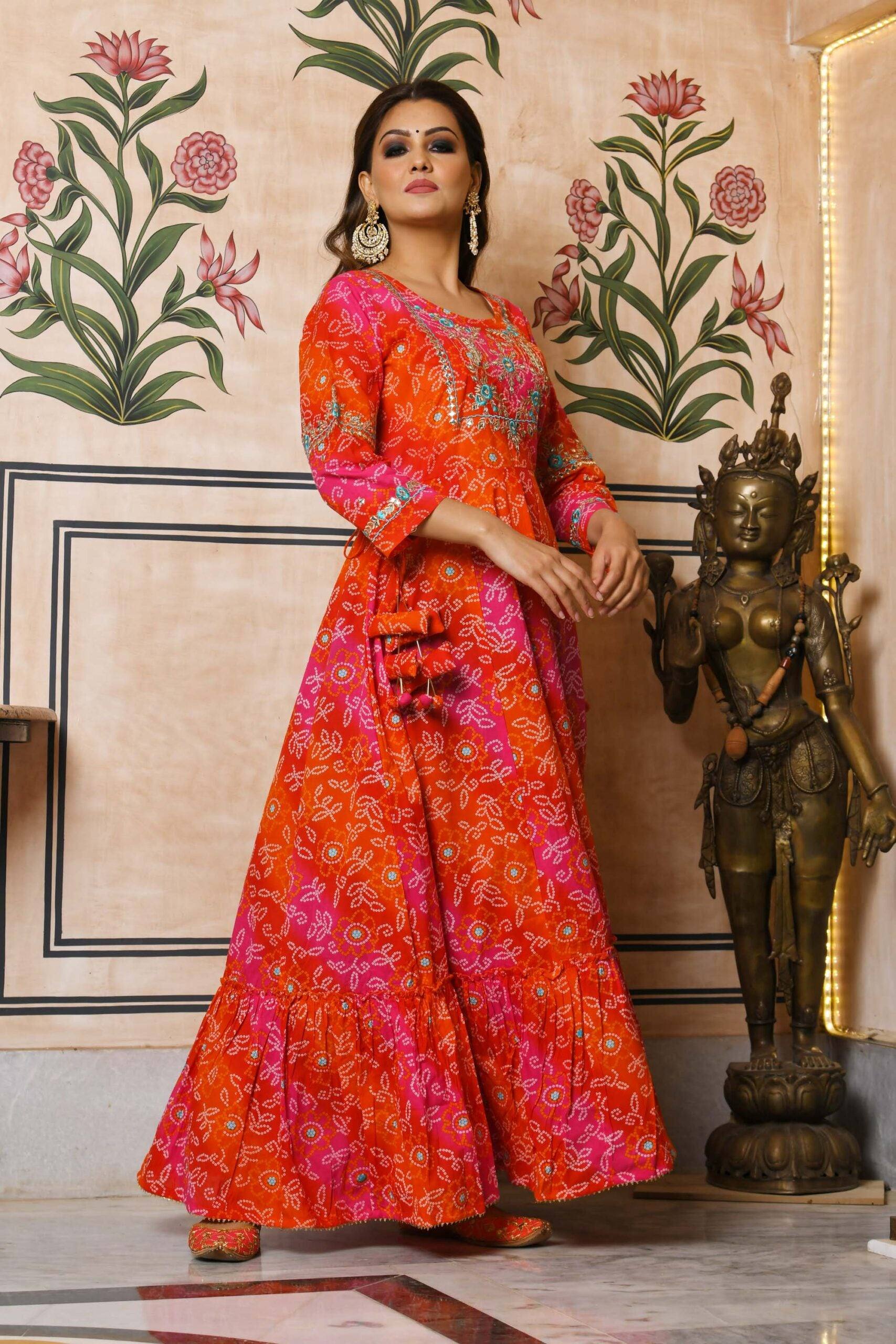 Buy Hot Pink Asymmetric Bandhani Printed Kurti With Tulip Style Dhoti by P  & S CO at Ogaan Online Shopping Site